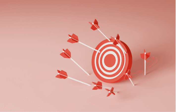 A graphic of a red target with red arrows hitting it from all angles