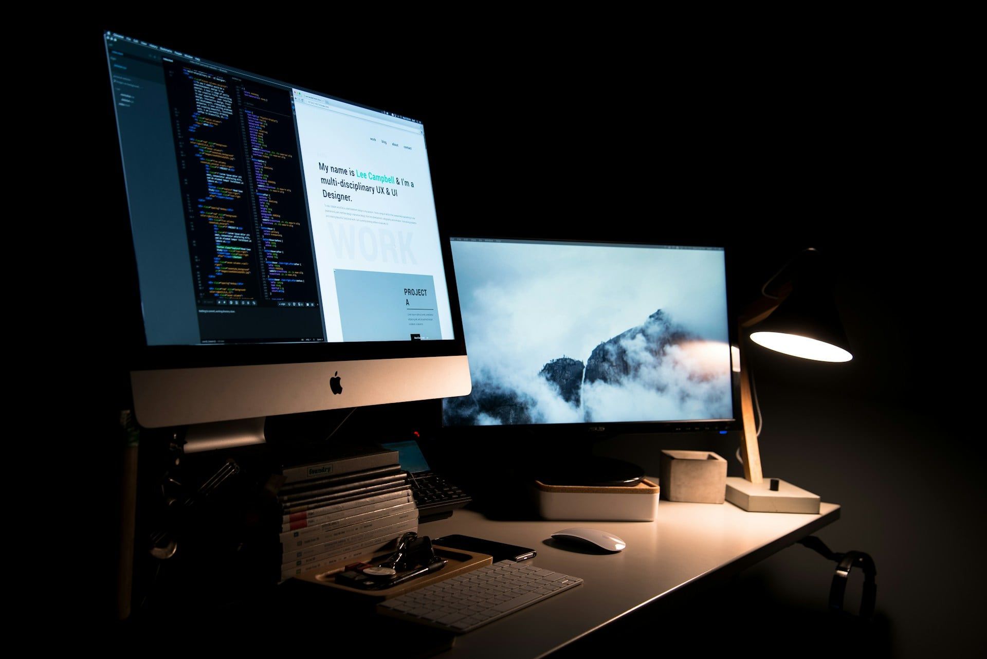 An aesthetic desktop setup with website design software open and loaded