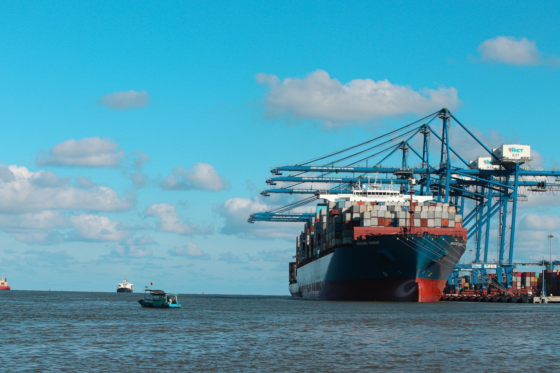 A large container ship in a port ready to do business all over the world